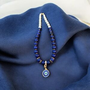 Blue and Gold Beaded Necklace with Evil Eye Pendant